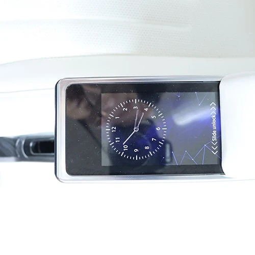 Touchscreen on the armrest of the Mercedes Sprinter seat 1